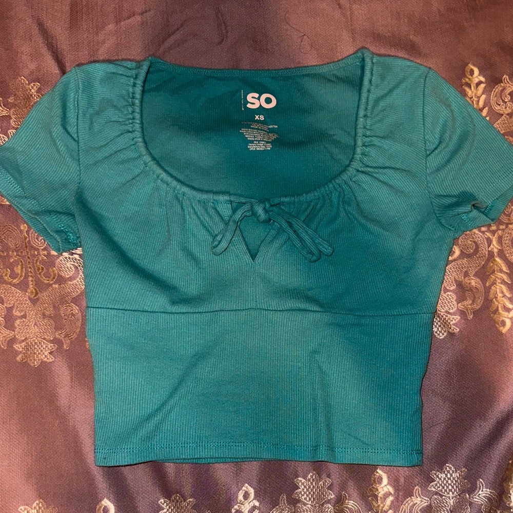 Cyan ribbed crop top with a bow detail